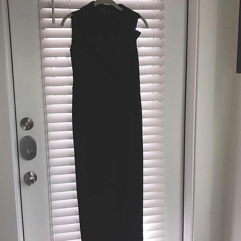 Black sleeveless jumpsuit, bought In London, wore once in good condition .